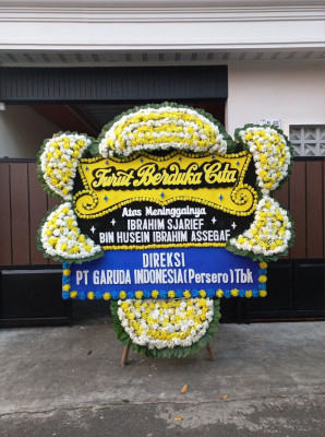 Papan Bunga Duka di Juli