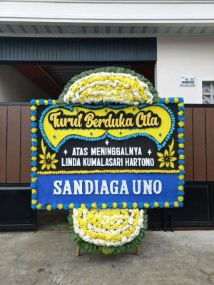 Papan Bunga Duka di Juli