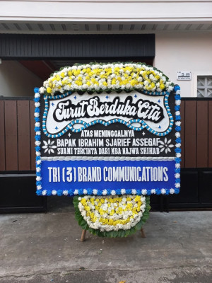 Papan Bunga Duka di Juli